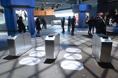 At 23 Wall Street, H&M installed futuristic directional turnstiles modeled after traditional subway station entrances. The setup complemented the invitation to the show, which came in the form of a mock subway ticket.