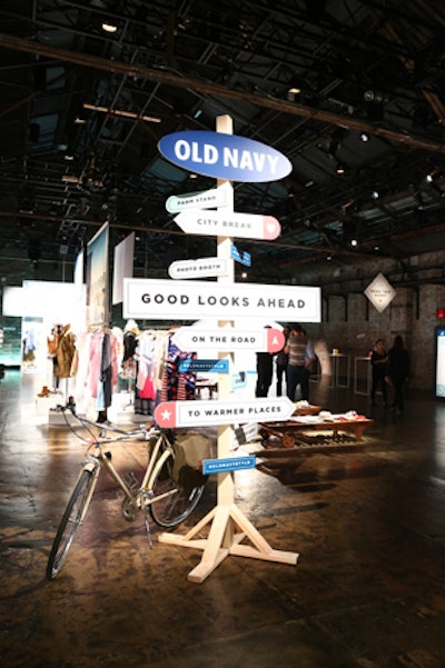 Signage meant to evoke road signs pointed guests to the various activities and offerings within the Old Navy preview event.
