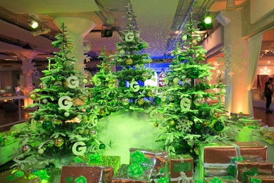 The winter wonderland-theme decor had trees decorated with Groupon's logo. Under the tree were wrapped gifts for the children in attendance.