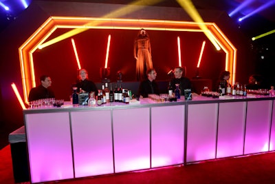 An illuminated bar front underscored the overall glowing look and feel of the party.