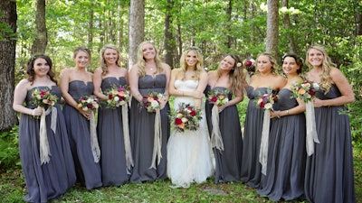 A Gemstone Of A Wedding Party With Lush Florals