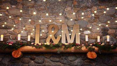 Bistro Lights And Candles Adorned The Initials Of This Happy Couple