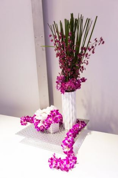 The brand's color, purple, dictated the decor scheme, including structural arrangements of flowers.