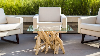 For a California-chic look, pair Blueprint Studios' Driftwood coffee table with San Simeon chairs.