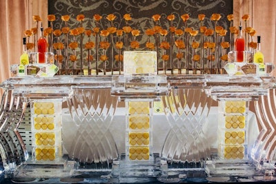With a bright garden-like backdrop of orange roses, an ice bar at the gala showcased frozen citrus wedges. The bar offered limoncello.