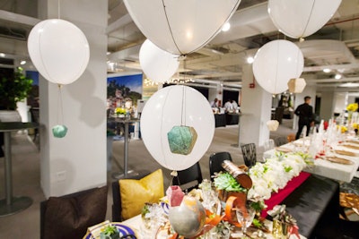 Design Industries Foundation Fighting AIDS’s Dining by Design event in Chicago in November included multiple tables with travel themes. One, designed by Gunlocke/HBF, had miniature hot-air balloons soaring above it, as well as a globe, clocks, and maps as decoration.