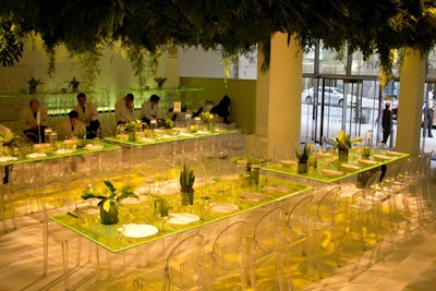 Dense arrangements of tropical plants were suspended between white pillars, creating a jungle-like canopy effect at the Museum of Modern Art’s 2013 Party in the Garden in New York.