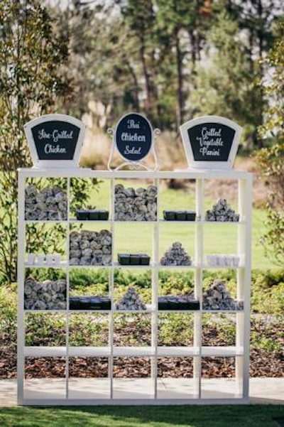 At the luncheon, some snacks were displayed in a vertical station topped with chalkboard signage. Options included Thai chicken salad and grilled vegetable paninis.