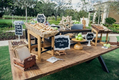 The sweets table displayed treats such as cranberry-orange scones and pecan-streusel coffee cake. To-go bags allowed guests to grab the desserts to eat or save for later.