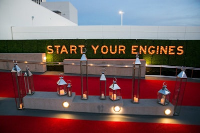 A 'Start Your Engines' sign nodded to the overall automotive theme.
