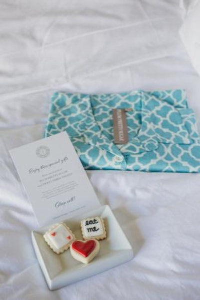 Attendees received thematic turn down gifts, including Alice in Wonderland-inspired sweets and pajama tops with designs that resembled the event's branding. Guests stayed at the conference's venue, the Four Seasons Resort Orlando at Walt Disney World.