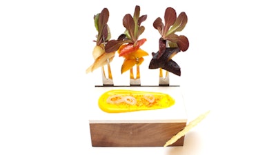 A carrot trio on a magnetic wood block