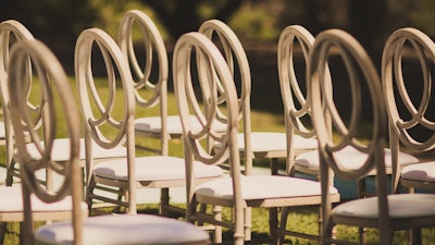 With multiple color options, Blueprint Studios' signature Infinity chairs provide a unique alternative to the standard Chiavari chair.