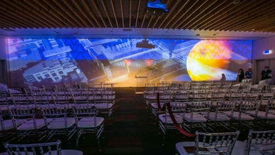 Projection mapping and digital ribbon cutting for a building dedication at The University of Chicago.