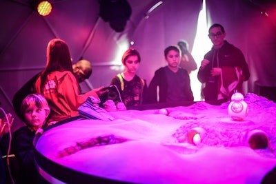 In the Use the Force dome, visitors could don a Jedi robe and, through a headband connected to an iPad, move a ball through an obstacle course.