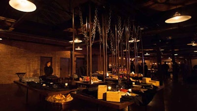 A suspended food station at a corporate steampunk holiday party, which was host to 850 guests at Morgan Manufacturing.