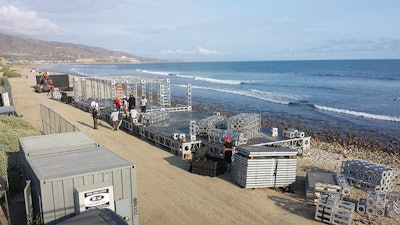 Mezzanine structure setup at Oakley Lowers Pro surf competition.