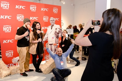 A photo op areas featured props and a life-size cut-out of KFC founder Colonel Sanders.