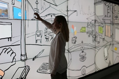 Microsoft brought an interactive digital wall to C.E.S. that allowed attendees to activate illustrations by touch, revealing key stats as well as some of the assets and tools that Microsoft can provide to its partners.