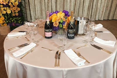 Linens with shimmer and a hint of metallic will complement the platinum and gold elements in the stage decor.