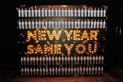 Svedka bottles and the message 'New Year, Same You' decorated a photo backdrop at the brand's 'Broken Resolutions' bash.