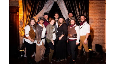 The NLED staff goes steampunk for a corporate steampunk holiday party at Morgan Manufacturing.