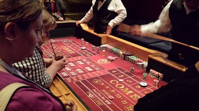 Roll the Dice on a Game of Craps.