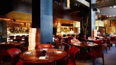 A variety of seating options complement the main dining area.