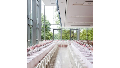A private dinner reception in the bright space of the Galleria Lower Level, which features floor to ceiling windows overlooking Philosopher's Walk.