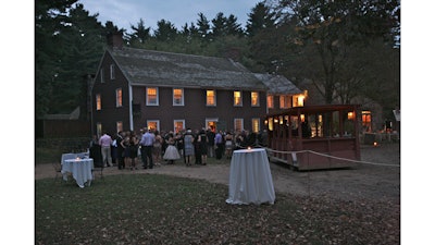 A cocktail reception outside of the Bullard Tavern.