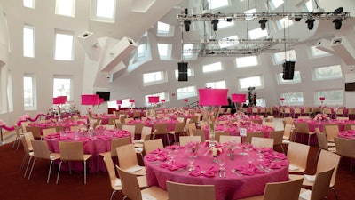 Pink table centerpieces at the Keep Memory Alive Event Center