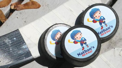 Create your own custom hockey pucks as event swag or for prizes
