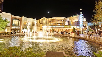 The Grove fountain at night.