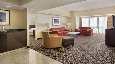 Our Deluxe Suites feature a separate living room.