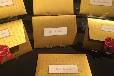 Marc Friedland created the golden envelopes bearing the winners' names.