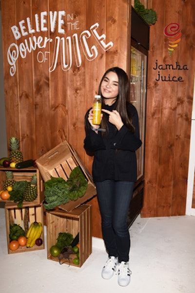 At Kari Feinstein's Style Lounge during Oscar week in Los Angeles, a setup for Jamba Juice included fresh produce displayed in farm crates.