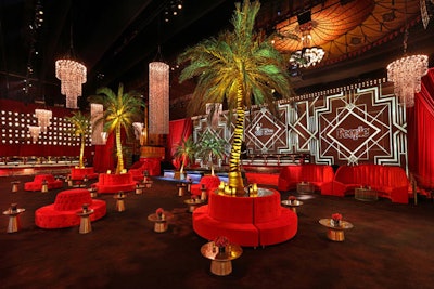 Lush green palms contrasted the red velvet seating and floor-to-ceiling red velvet drapes at the SAG awards' official after-party, which was held at the Shrine Auditorium this year.