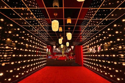 Guests entered through a passageway decorated with theater-style lighting.