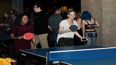 Models battle it out on the ping pong floor at SPiN Chicago.