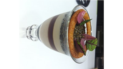 Sterling white sturgeon caviar with sauce soubise, onion consommé, and pickled pearl onions at Bouchon