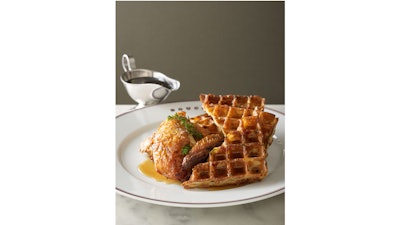 Bouchon’s roasted chicken with a bacon and chive waffle, maple syrup, and sauce chasseur