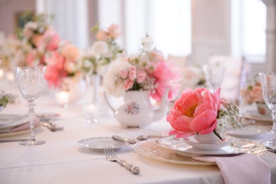 At a baby shower created by Chicago-based Christina Janda Design & Events, guests took home a vintage cup and saucer filled with big blooming flowers.