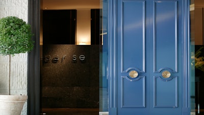 The Per Se experience begins as soon as guests enter past the iconic blue doors.