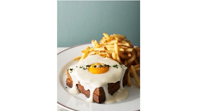 Grilled ham and cheese on brioche with a fried egg and Mornay sauce at Bouchon