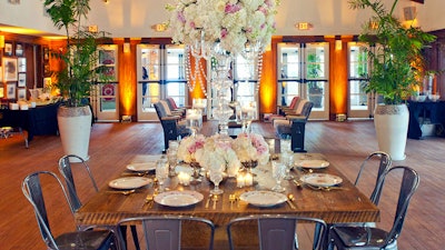 The ballroom setup for an event hosted by the Elite Bridal Network