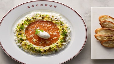Salmon tartare, hard-boiled eggs, red onions, capers, and crème fraîche served with toasted croutons