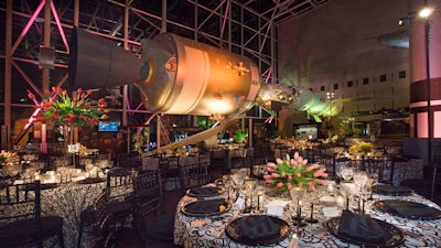 A seated dinner next to the historic Apollo-Soyuz