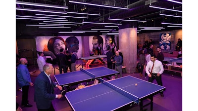 Chicago is officially a ping pong hotspot. Attendees at the grand opening party sharpen their ping pong skills.