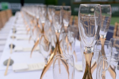 Unusual golden flutes provided decor for an otherwise understated tabletop.