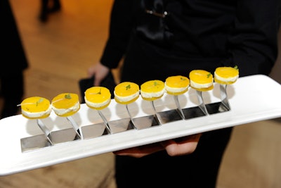 Servers passed a selection of hors d'oeuvres, including yellow beets with goat cheese, from Daniel et Daniel Event Creation & Catering, at the inaugural Chef's Challenge for a Cure gala in November 2010 at the Carlu in Toronto.